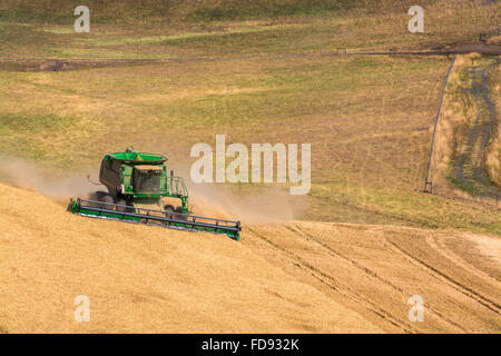 John Deere combines harvesting wheat in the Palouse region of Eastern ...