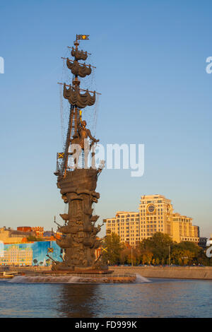 Gigantic Peter the Great monument by sculptor Zurab Tsereteli on the Moskva River at dusk, Moscow, Russia