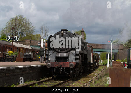 BR 9F locomotive 92214 Central Star working a passenger train on the ...