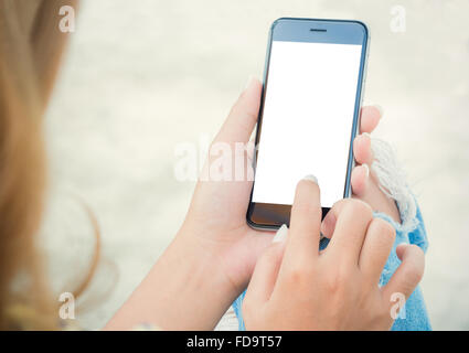 closeup women using phone from back view Stock Photo
