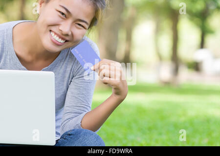 happy woman with credit card and laptop new lifestyle easy payment shopping online Stock Photo