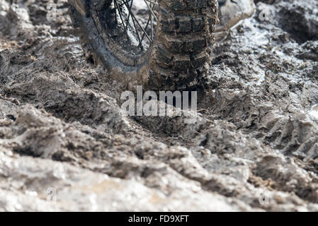 Thurmansbang, Germany. 29th Jan, 2016. A motorcyclist steers his bike through the mud at the venue of the 'Elefantentreffen' (lit. Elephant meeting) motorcyle meting in Thurmansbang, Germany, 29 January 2016. Organizers expect about 4,000 bikers at the 60th Elefantentreffen of the federal association of motorcyclists (BVDM). Photo: Armin Weigel/dpa/Alamy Live News Stock Photo