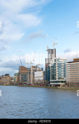 Tall buildings being built on the south side of the River Thames London UK Stock Photo