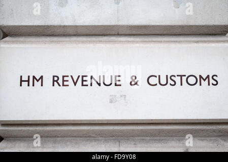 The sign for HM Revenue and Customs on the office building in Whitehall London UK (Tax office)