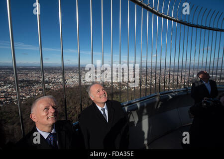 Stuttgart, Germany. 29th Jan, 2016. The chairman of regional public broadcaster SWR, Peter Boudgoust (R) and Stuttgart's mayor Fritz Kuhn (Alliance 90/Green Party) stand on the viewing platform of the television tower in Stuttgart, Germany, 29 January 2016. The viewing platform in top of the television tower, one of Stuttgart's landmarks, will be reopened to the public after three years of extensive refurbishment from 30 January onwards. Photo: Marijan Murat/dpa/Alamy Live News Stock Photo