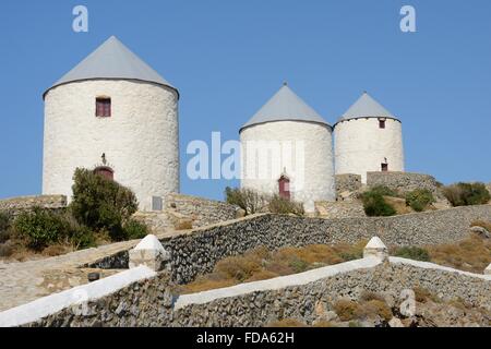 Row of old windmills on Pitiki Hill, Platanos, Leros, Dodecanese Islands, Greece. Stock Photo