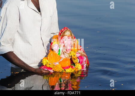 1 Adult Man Gods Statues Ganpati Ganesh Chaturthi River Drowning Stock Photo