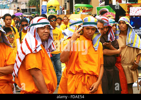 Philippines Cebu Cebu City Sinulog festival. Musicians, and others taking part in the street procession  Adrian Baker Stock Photo