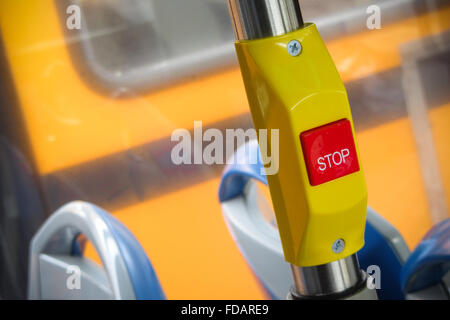 Stop on request button on bus Stock Photo