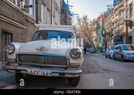 Old Volga Soviet car in a street in Tbilisi, Georgia. Stock Photo