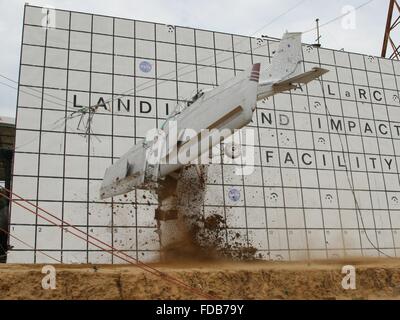 A Cessna 172 aircraft is dropped to the concrete from 82 feet at the Landing and Impact Research Facility at NASA's Langley Research Center July 26, 2015 in Hampton, Virginia. The test is to improve general aviation emergency locator beacons which often fail after a crash and are critical for search and rescue. Stock Photo