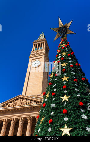 Brisbane city Christmas tree and a City Hall tower against the blue sky Stock Photo