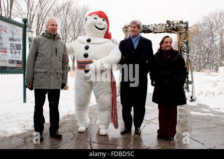 Quebec, Canada. 29th Jan, 2016. U.S Secretary of State John Kerry poses with mascot Bonhomme Carnaval with Mexican Foreign Minister Claudia Ruiz Massieu and Canadian Foreign Minister Stephane Dion, left, in Battlefields Park during a break in the North American Ministerial Meeting January 29, 2016 in Quebec City, Quebec. Stock Photo