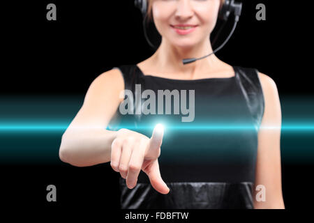 business woman presses a button on the touch screen. Stock Photo