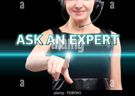 businesswoman, Focus on hand pressing Ask an expert button. virtual screens, technology, internet concept. Stock Photo