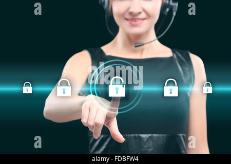 business technology and internet concept - businesswoman ressing button on virtual screens. Stock Photo