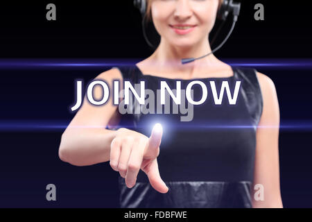businesswoman,  hand pressing join now button on virtual screens, business concept. Stock Photo