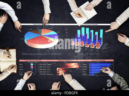 Top view of people hands drawing marketing strategy Stock Photo