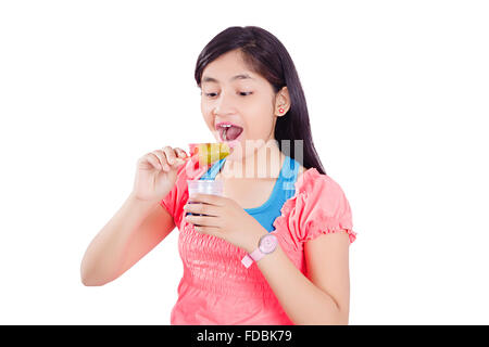 1 Teenager Girl Eating Delicious Ice cream Stock Photo