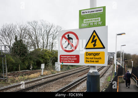 Warning signs on Network Rail railway line near Barnes Bridge station in London, UK Stock Photo