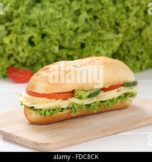 Healthy eating sub deli sandwich baguette with cheese, tomatoes and lettuce Stock Photo