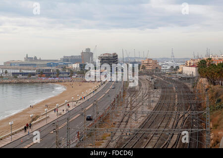 View of the front sea of the city of Tarragona, with the beach, train station and railway, Stock Photo