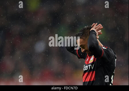 Leverkusen, Germany. 30th Jan, 2016. Leverkusen's Karim Bellarabi holds his head during the German Bundesliga football match between Bayer Leverkusen and Hannover 96, at the BayArena in Leverkusen, Germany, 30 January 2016. PHOTO: FEDERICO GAMBARINI/DPA (EMBARGO CONDITIONS - ATTENTION: Due to the accreditation guidelines, the DFL only permits the publication and utilisation of up to 15 pictures per match on the internet and in online media during the match.) Credit:  dpa/Alamy Live News Stock Photo