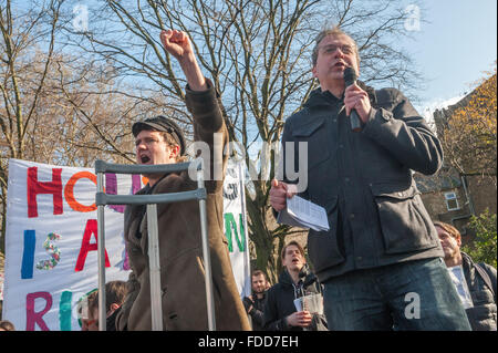 Simon Elmer of Architect for Social Housing (left) shouts and raises his fist as Richard Livingstone, Southwark Council Cabinet Member for Housing, speaks before the march organised by Lambeth Housing Activists against the Housing and Planning Bill. Housing activists accuse the council of social cleansing  for demolishing council estates including the Heygate and Aylesbury. Credit:  Peter Marshall/17�Թ����� Live News Stock Photo