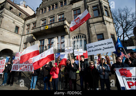 Wroclaw, Poland. 30th January, 2016. People protest against European Union and German policy on Poland outside of German Consulate in Wroclaw. Credit:  Marcin Rozpedowski/Alamy Live News Stock Photo