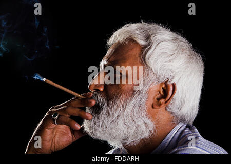 1 indian Senior Adult Man Smoking Cigarette Stock Photo