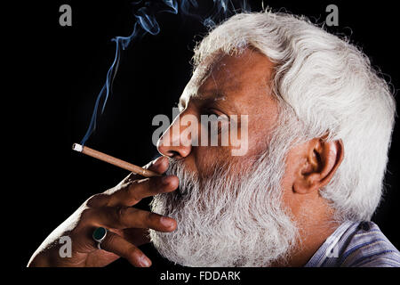 1 indian Senior Adult Man Smoking Cigarette Stock Photo