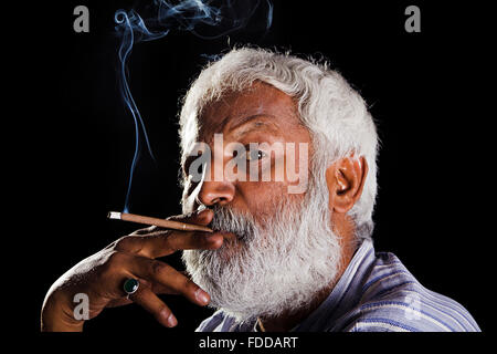 1 indian Senior Adult Man Smoking Cigarette Stock Photo