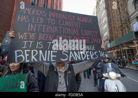 New York, USA. 30th Jan, 2016. Demonstrators hold signs and chant in support of Bernie Sanders. Supporters of Democratic Presidential candidate Bernie Sanders rallied in Union Square Park in New York City and marched on Broadway to Zuccotti Park in lower Manhattan. Credit:  Albin Lohr-Jones/Pacific Press/Alamy Live News Stock Photo