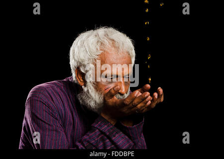 1 indian Senior Adult Man Alcohol Drinking Addiction Stock Photo