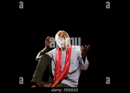 1 indian Senior Adult Man Villager Sitting Smoking Bidi Looking Up Excitement Stock Photo