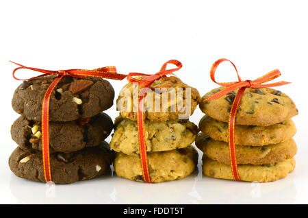 Cookies and Red Ribbons Isolated on White Background. Stock Photo