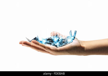 Pile of laptops in human hand. Technology concept Stock Photo