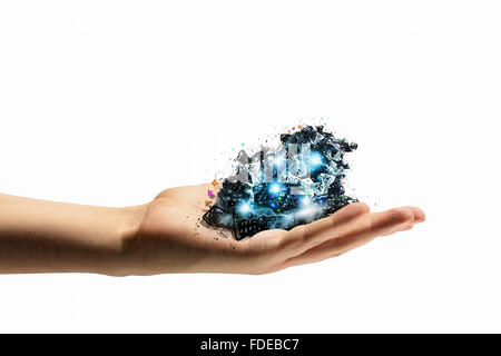 Pile of crushed keyboards in human hand Stock Photo