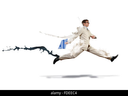 Funny young office worker running in a hurry Stock Photo