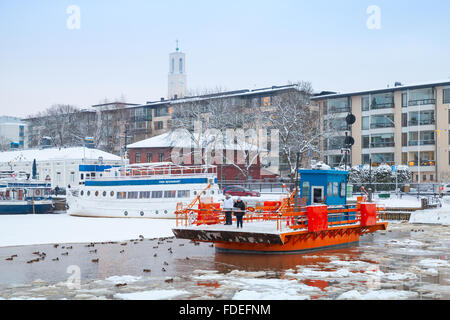 Turku, Finland - January 17, 2016: Ordinary passengers on historic city boat Fori, light traffic ferry Stock Photo