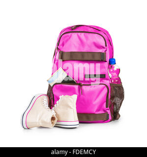 Pink backpack with bottle of water, smart phone, map and sport shoes isolated on white background. Tourism and travel themes. Cl Stock Photo