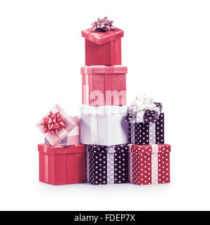 Stacked gift boxes with ribbon bow. Christmas present. Croup of objects isolated on white background Stock Photo