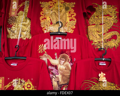 Bangkok, Bangkok, Thailand. 31st Jan, 2016. Chinese New Year tee shirts, decorated with monkey graphics, at a stand on Yaowarat Road in Bangkok's Chinatown. Chinese New Year, also called Lunar New Year or Tet (in Vietnamese communities) starts Monday February 8. The coming year will be the ''Year of the Monkey.'' Thailand has the largest overseas Chinese population in the world; about 14 percent of Thais are of Chinese ancestry and some Chinese holidays, especially Chinese New Year, are widely celebrated in Thailand. © Jack Kurtz/ZUMA Wire/Alamy Live News Stock Photo