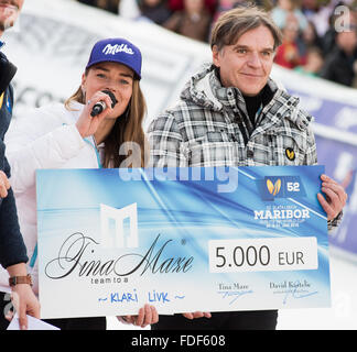 Maribor, Slovenia. 30th January, 2016. Tina Maze of Slovenia presenting donation to another Slovenian skier at Golden Fox in Maribor, Slovenia. Credit:  Rok Rakun/Pacific Press/Alamy Live News Stock Photo