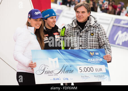 Maribor, Slovenia. 30th January, 2016. Tina Maze of Slovenia presenting donation to another Slovenian skier at Golden Fox in Maribor, Slovenia. Credit:  Rok Rakun/Pacific Press/Alamy Live News Stock Photo