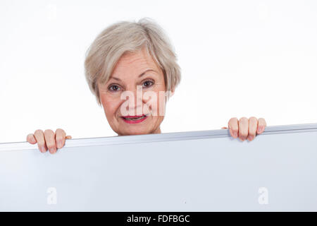 confident senior older women smiling with ad sign in hands text space Stock Photo