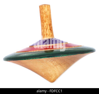 Traditional wooden spinning top of Indian subcontinent over white background Stock Photo