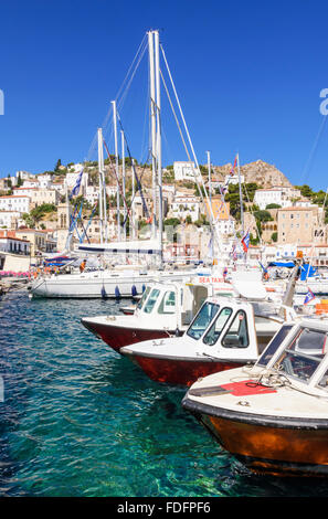 Boats moored along Hydra Town's waterfront, Hydra Island, Greece Stock Photo