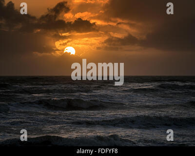 Sunset over the English Channel near Brighton, East Sussex, England Stock Photo