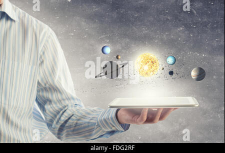 Close up of planet sun system in your hand Stock Photo